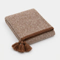 Knitted Tassel Throw with Border Detail in Rust