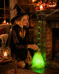 Light-up witch's broom decoration with green LED lights, vibration and sound effect