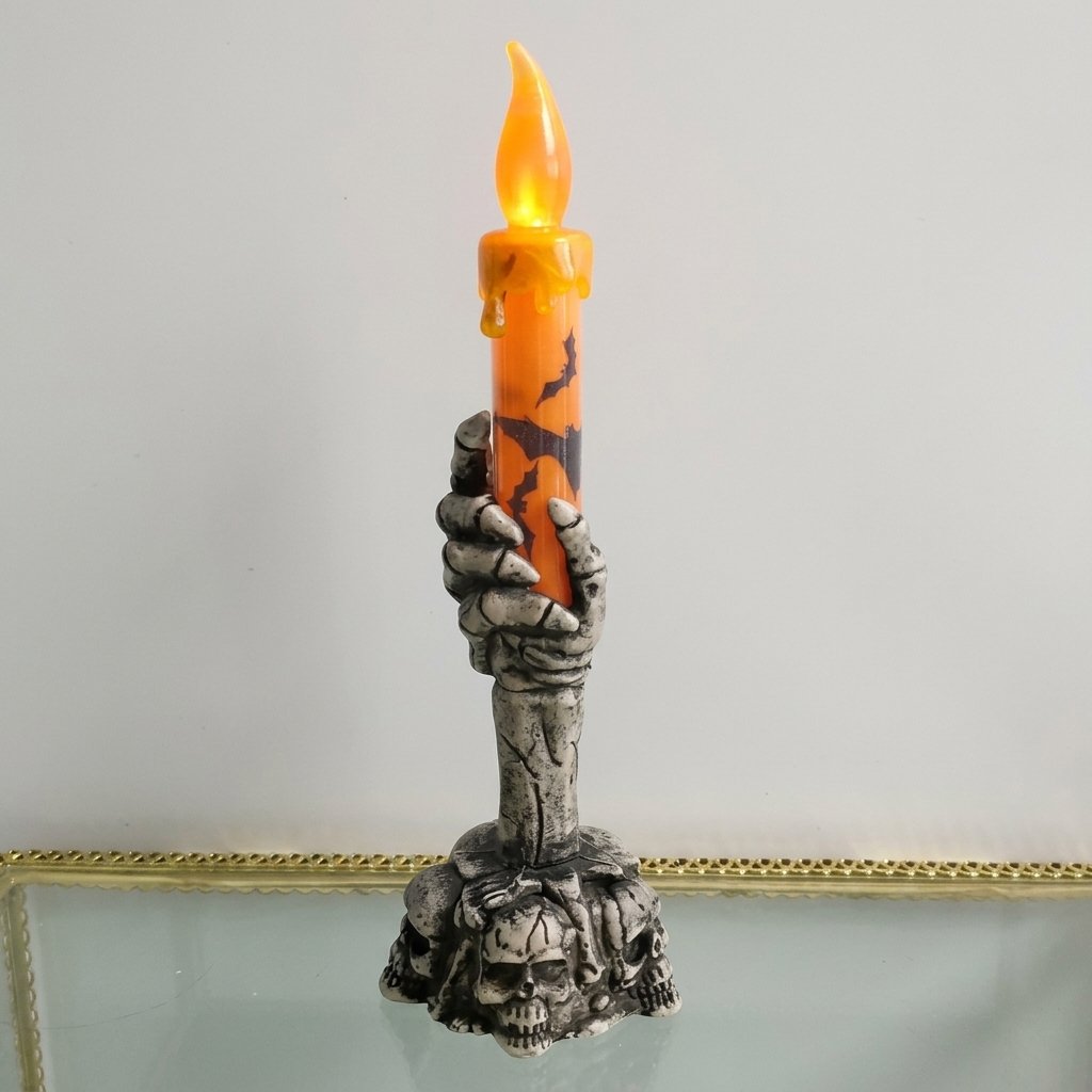 Halloween Flameless LED Taper Candle with Skeleton Hand Holder – Battery Operated, Orange or Green — Orange