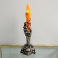 Halloween Flameless LED Taper Candle with Skeleton Hand Holder – Battery Operated, Orange or Green — Orange
